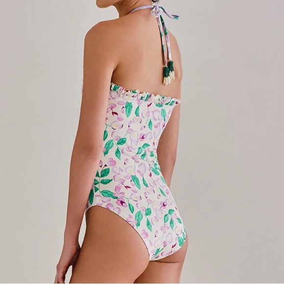 Palmacea, one piece, tied swimsuit with cut outs.  
Size M - Picture 11 of 12